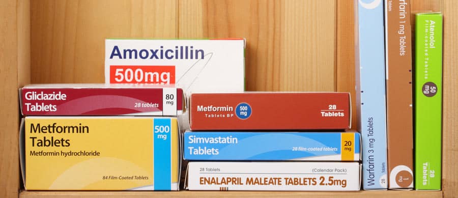 Various prescription drug boxes symbolizing commonly abused medications, illustrating warning signs like dependence, doctor shopping, and misuse.